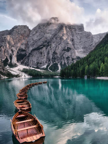 Lago di Braies and wooden boats, Dolomites, Italy