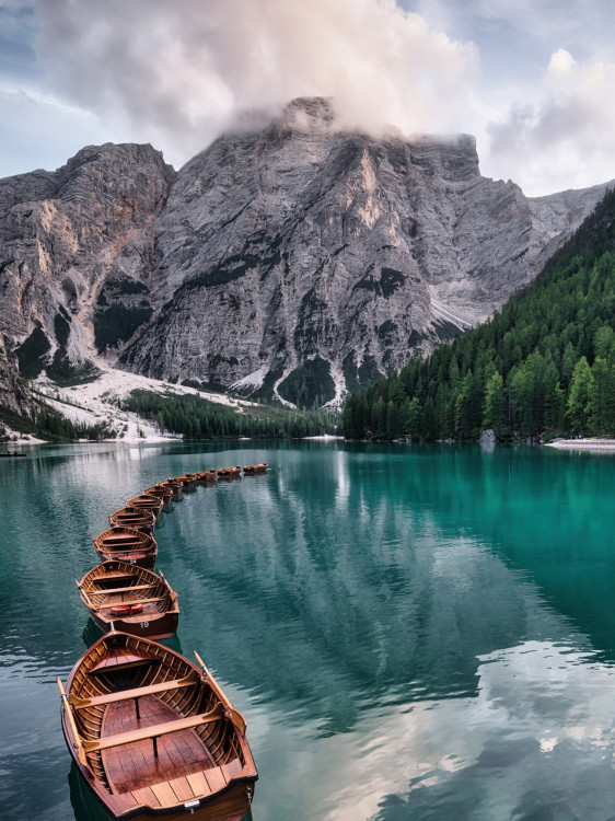 Lago di Braies and wooden boats, Dolomites, Italy