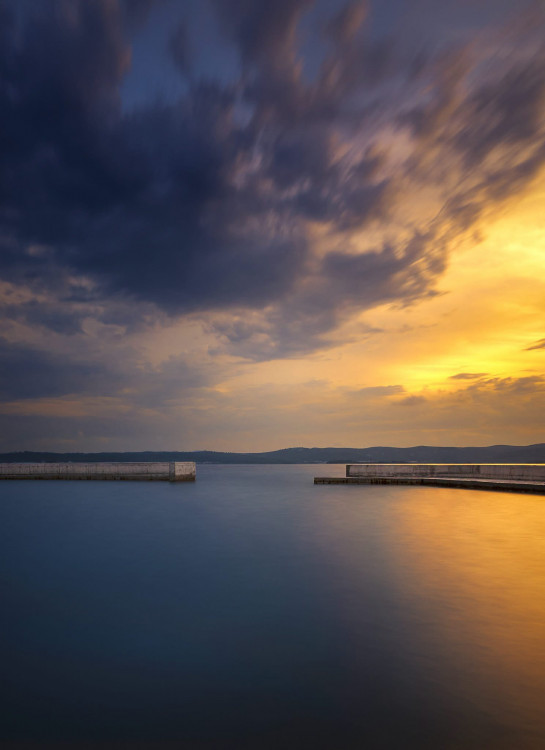 na mori pri západe slnka