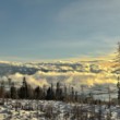 Slnko nad oblakmi