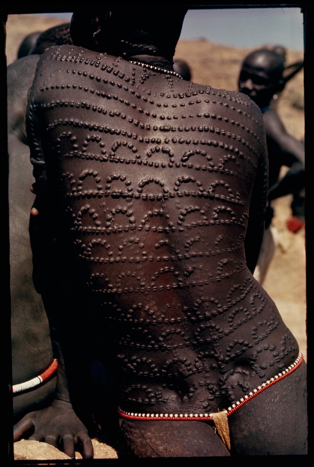Welts, scars of beauty, pattern the entire back of a Nuba woman in Sudan, 1966. PHOTOGRAPH BY HORST LUZ, NATIONAL GEOGRAPHIC CREATIVE