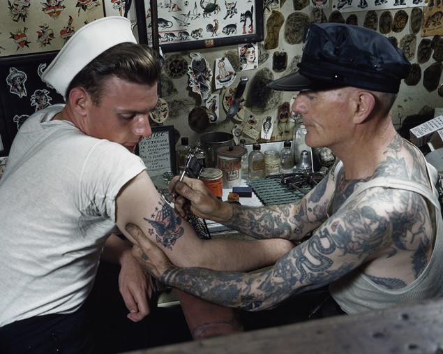 A sailor gets a tattoo on his arm in Virginia. PHOTOGRAPH BY PAUL L. PRYOR, NATIONAL GEOGRAPHIC