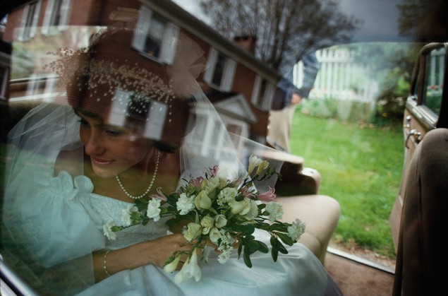 A bride leaves for the Old Dutch Church in Sleepy Hollow, New York, 1987. PHOTOGRAPH BY JODI COBB, NATIONAL GEOGRAPHIC