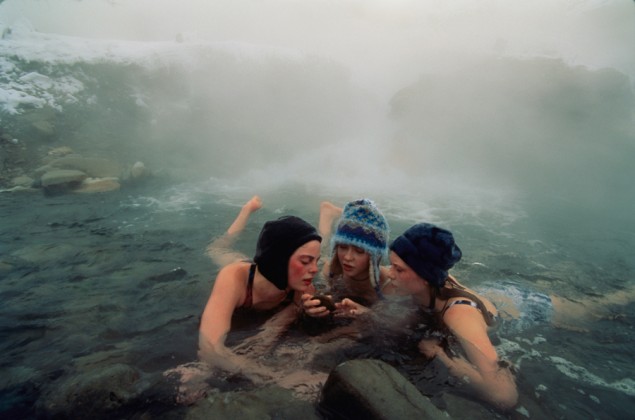 High school friends enjoy a thermal spring near Gardiner, Montana, April 1997. PHOTOGRAPH BY ANNIE GRIFFITHS, NATIONAL GEOGRAPHIC