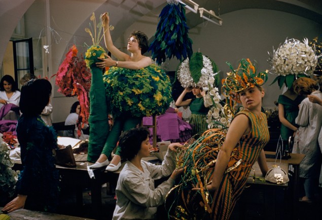 Fashion students add last touches to models’ wild peacock costumes in Vienna, Austria, February 1959. PHOTOGRAPH BY VOLKMAR K. WENTZEL, NATIONAL GEOGRAPHIC