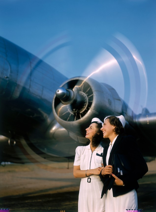 Two young women stand near a turning aircraft propeller, 1940. PHOTOGRAPH BY LUIS MARDEN, NATIONAL GEOGRAPHIC CREATIVE
