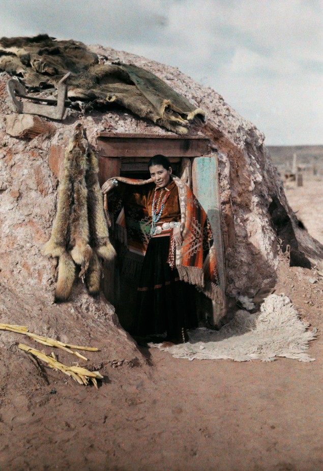 A girl stands in front of her hut on the Painted Desert in Arizona in 1929. PHOTOGRAPH BY CLIFTON R. ADAMS, NATIONAL GEOGRAPHIC