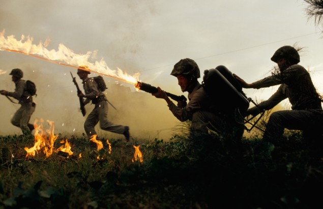 Marine infantry in Taiwan practice using flame throwers in a simulated battle, January 1969. PHOTOGRAPH BY FRANK AND HELEN SCHREIDER, NATIONAL GEOGRAPHIC