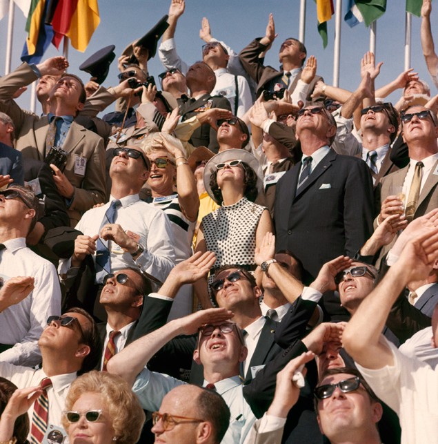 President and Mrs. Johnson and Vice President Humphrey watch Apollo 11 lift off at Cape Canaveral, July 1969. PHOTOGRAPH BY OTIS IMBODEN, NATIONAL GEOGRAPHIC