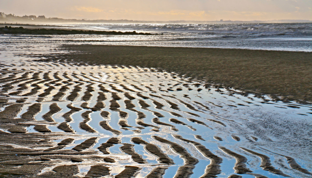 Odliv na pobreží Normandie