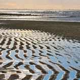 Odliv na pobreží Normandie